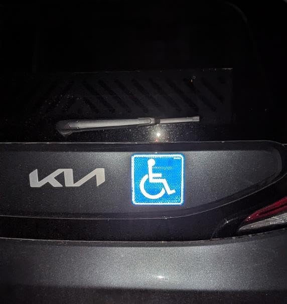 Customer photo of a reflective DrivoSign Handicap Sign magnet